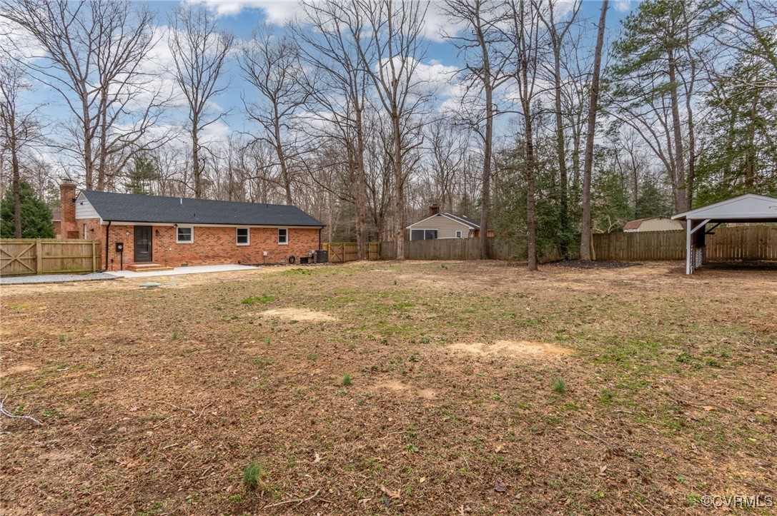 102 Riva Ridge Circle Sandston, VA 23150 - Photo 23 of 23 View of yard with a fenced backyard