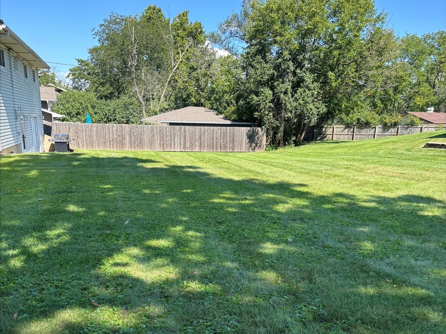 21W246 Audubon Road Lombard, IL 60148 - Photo 4 of 19 a view of a house with a yard and sitting area