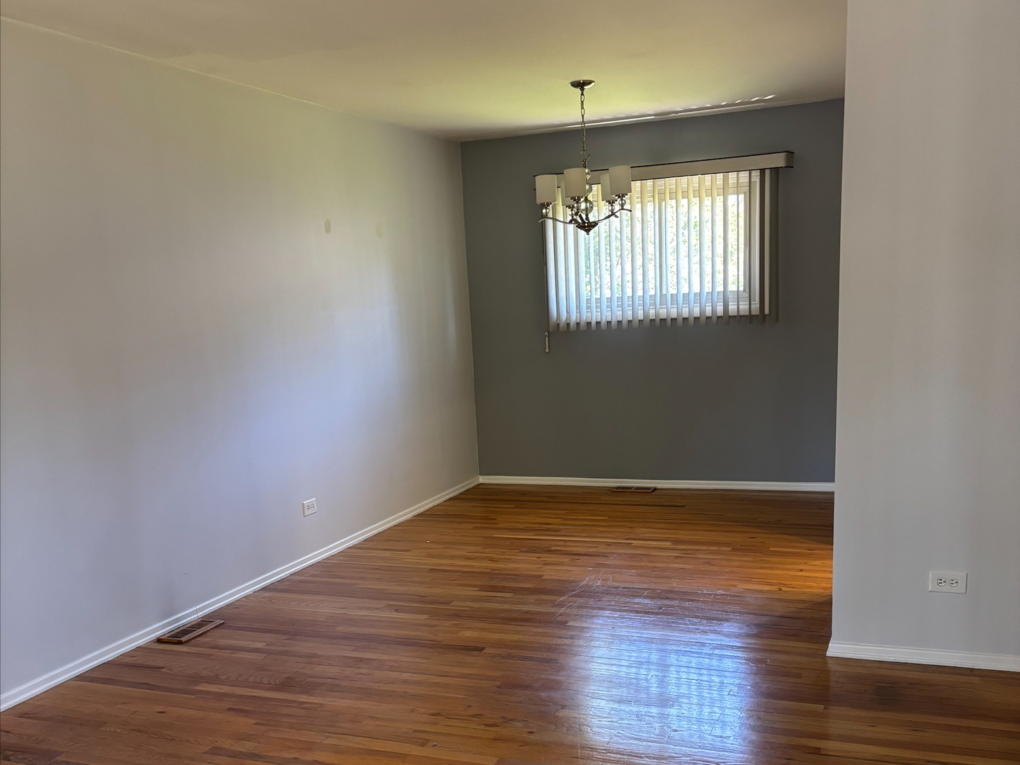 21W246 Audubon Road Lombard, IL 60148 - Photo 10 of 19 a view of empty room with wooden floor and fan
