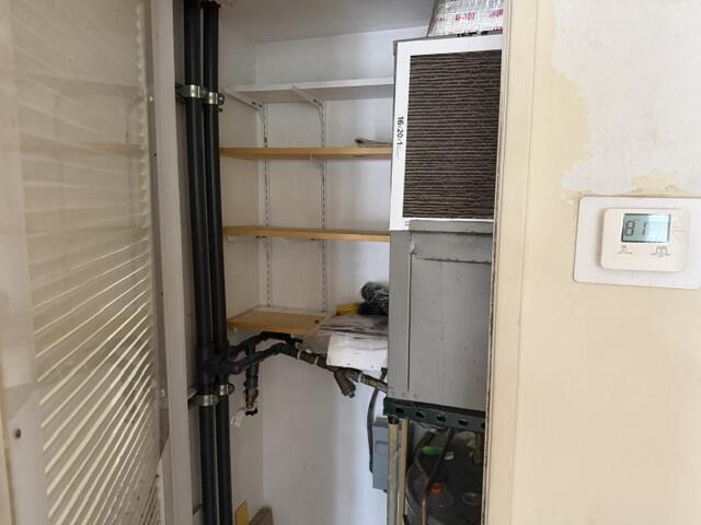 660 Glouchester Street, Unit 206 Boca Raton, FL 33487 - Photo 7 of 13 a view of walk in closet with empty racks