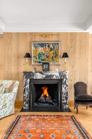 a bathroom with a sink toilet a mirror and shower