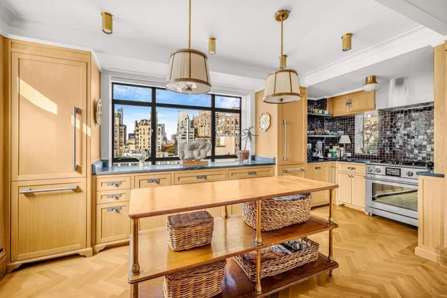 a picture of a bathroom with a sink and a white wall