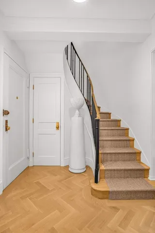 a room with furniture and large window