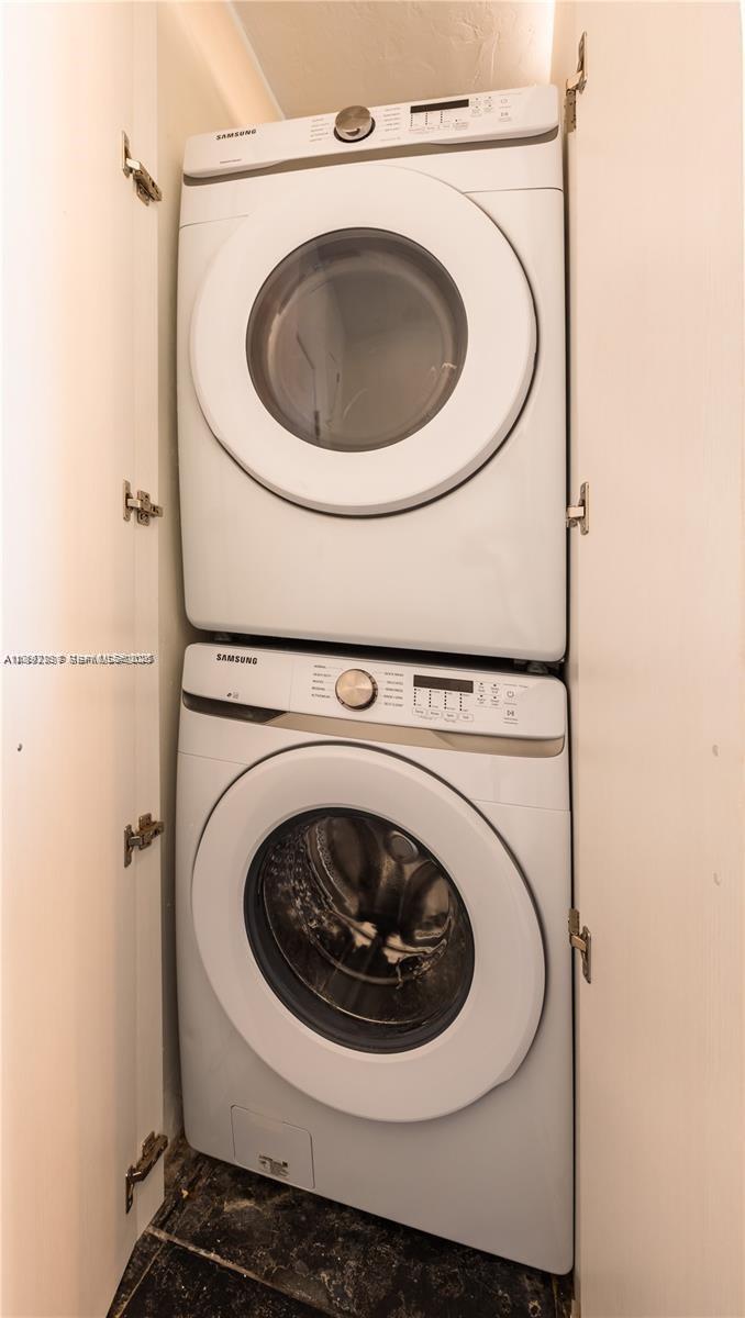 426 Northeast 26th Street, Unit 1 Miami, FL 33137 - Photo 16 of 23 a utility room with dryer and washer