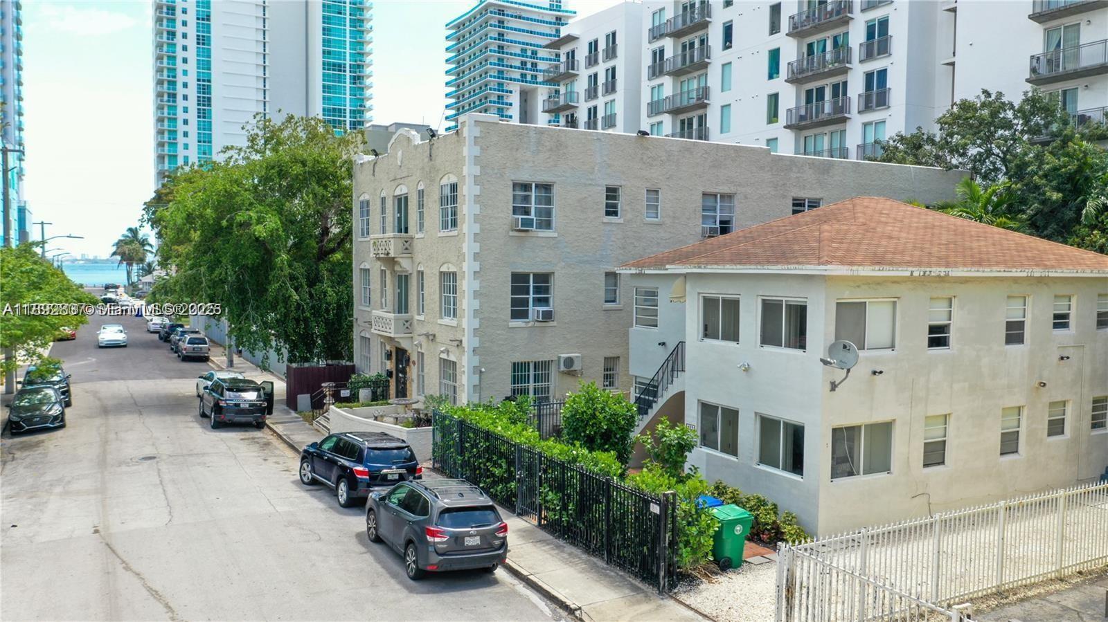 426 Northeast 26th Street, Unit 1 Miami, FL 33137 - Photo 22 of 23 a view of multiple houses with a yard