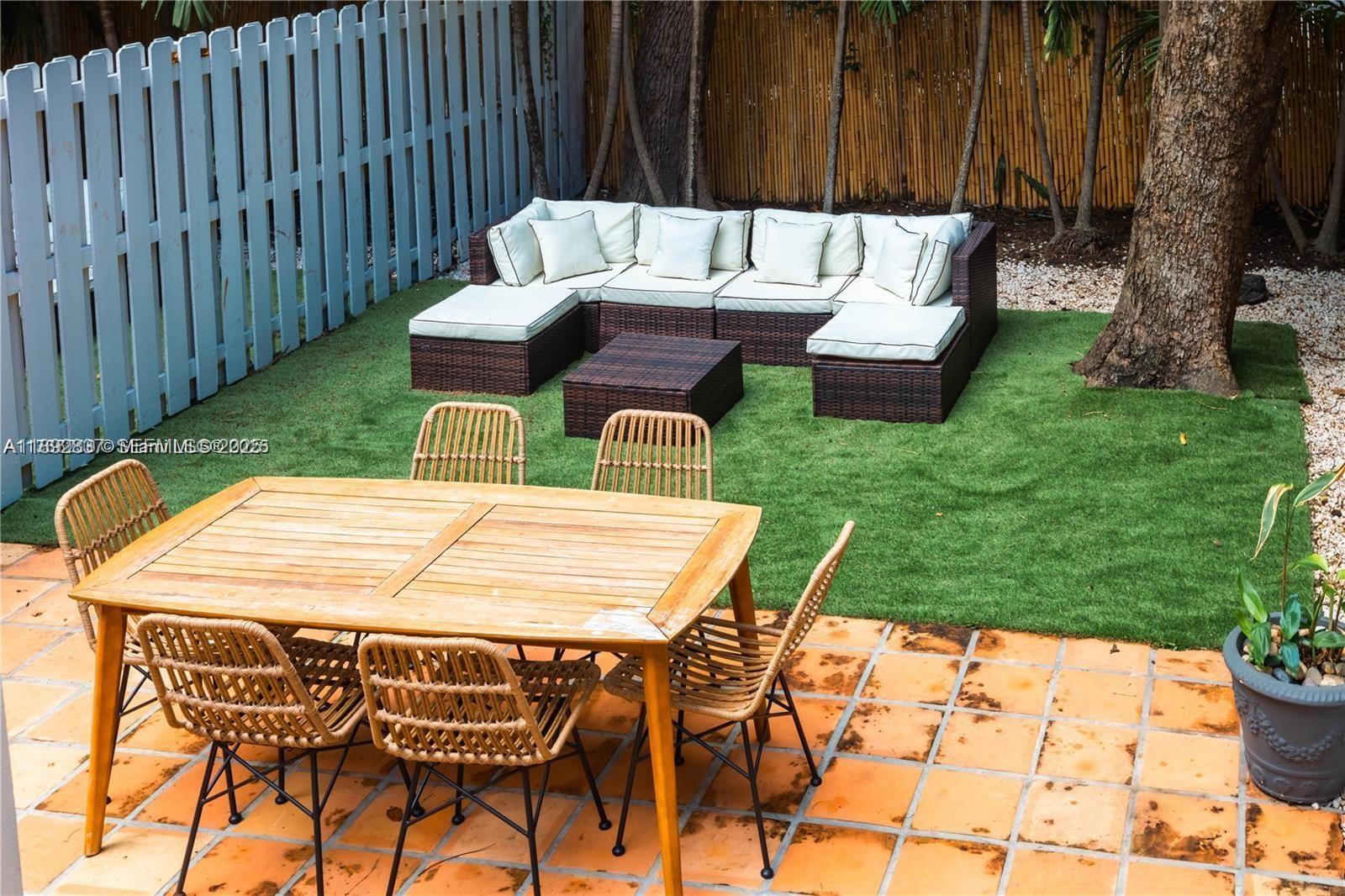 426 Northeast 26th Street, Unit 1 Miami, FL 33137 - Photo 7 of 23 a view of an outdoor sitting area with furniture