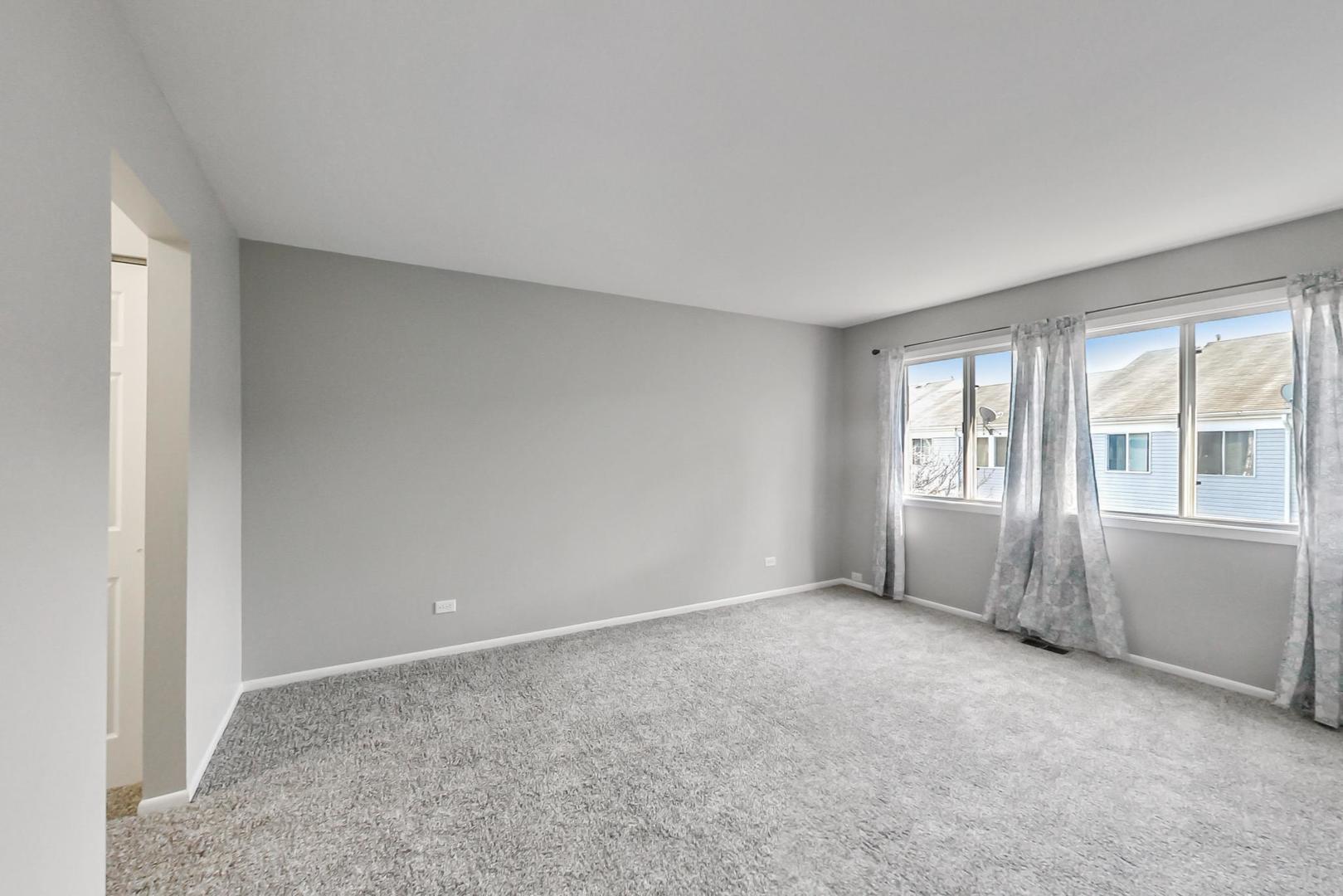 822 Minnesota Circle Carol Stream, IL 60188 - Photo 11 of 14 a view of an empty room with a window