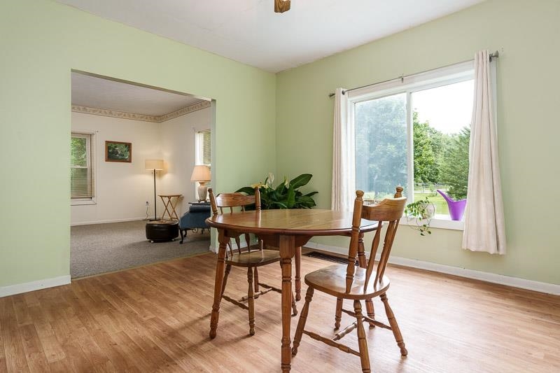 3982 Pann Road South Beloit, IL 61080 - Photo 57 of 84 a view of a dining room with furniture and wooden floor