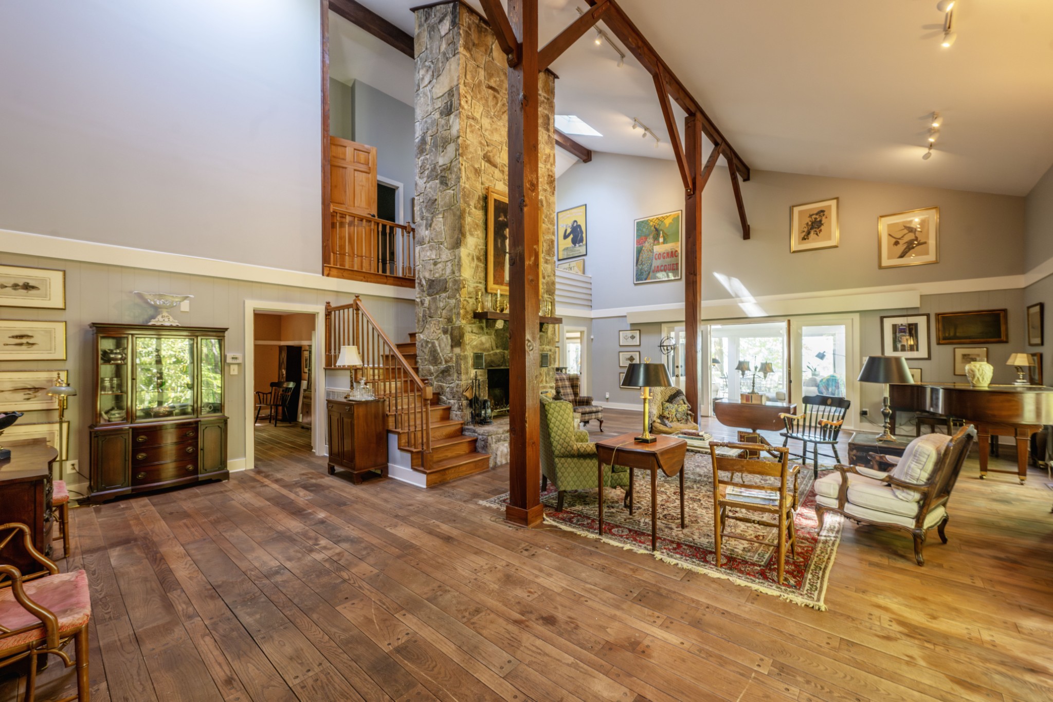 3442 Sherwood Road Sewanee, TN 37375 - Photo 11 of 28 a view of a big room with furniture wooden floor and windows