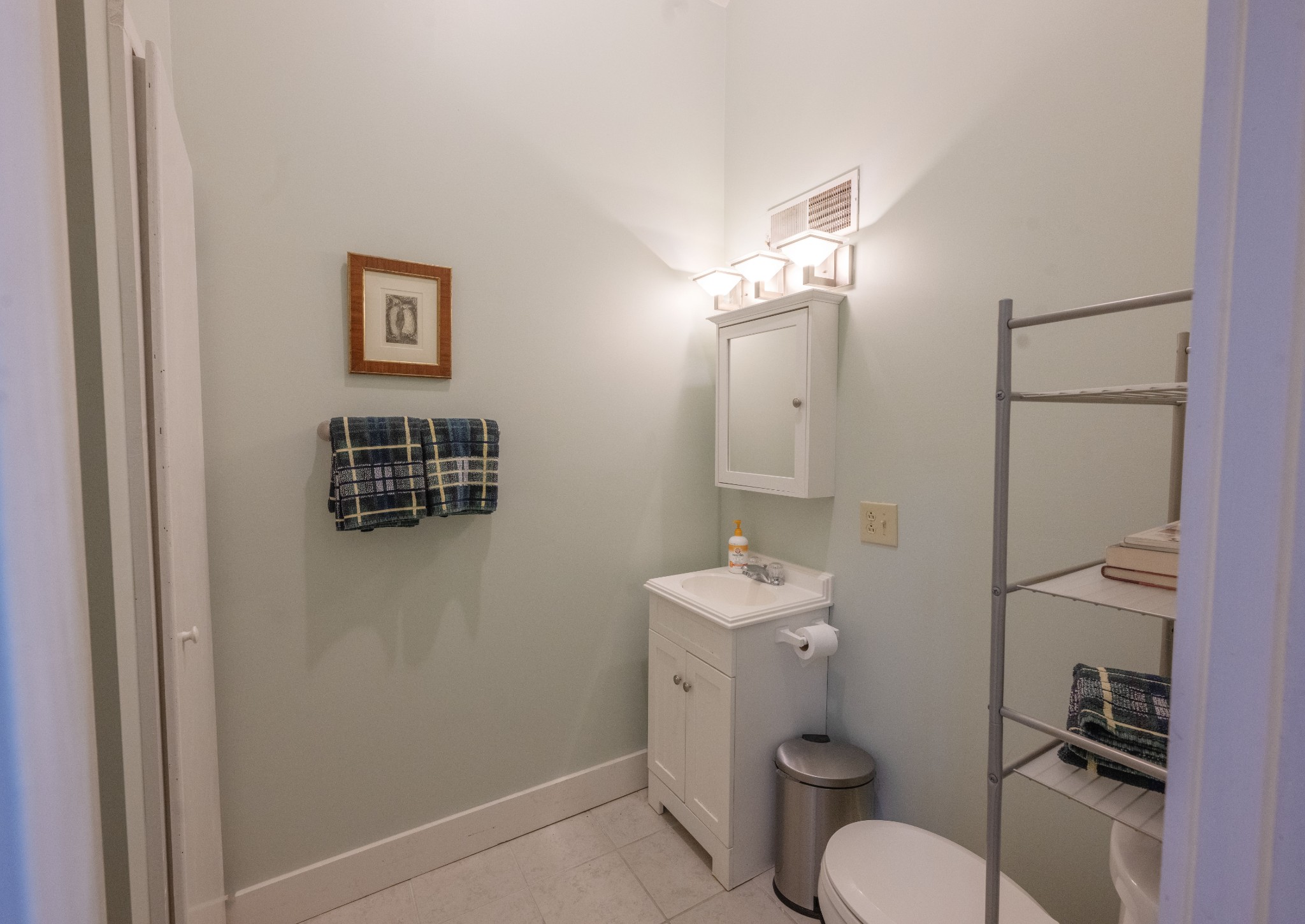 3442 Sherwood Road Sewanee, TN 37375 - Photo 24 of 28 a bathroom with a toilet a sink and mirror