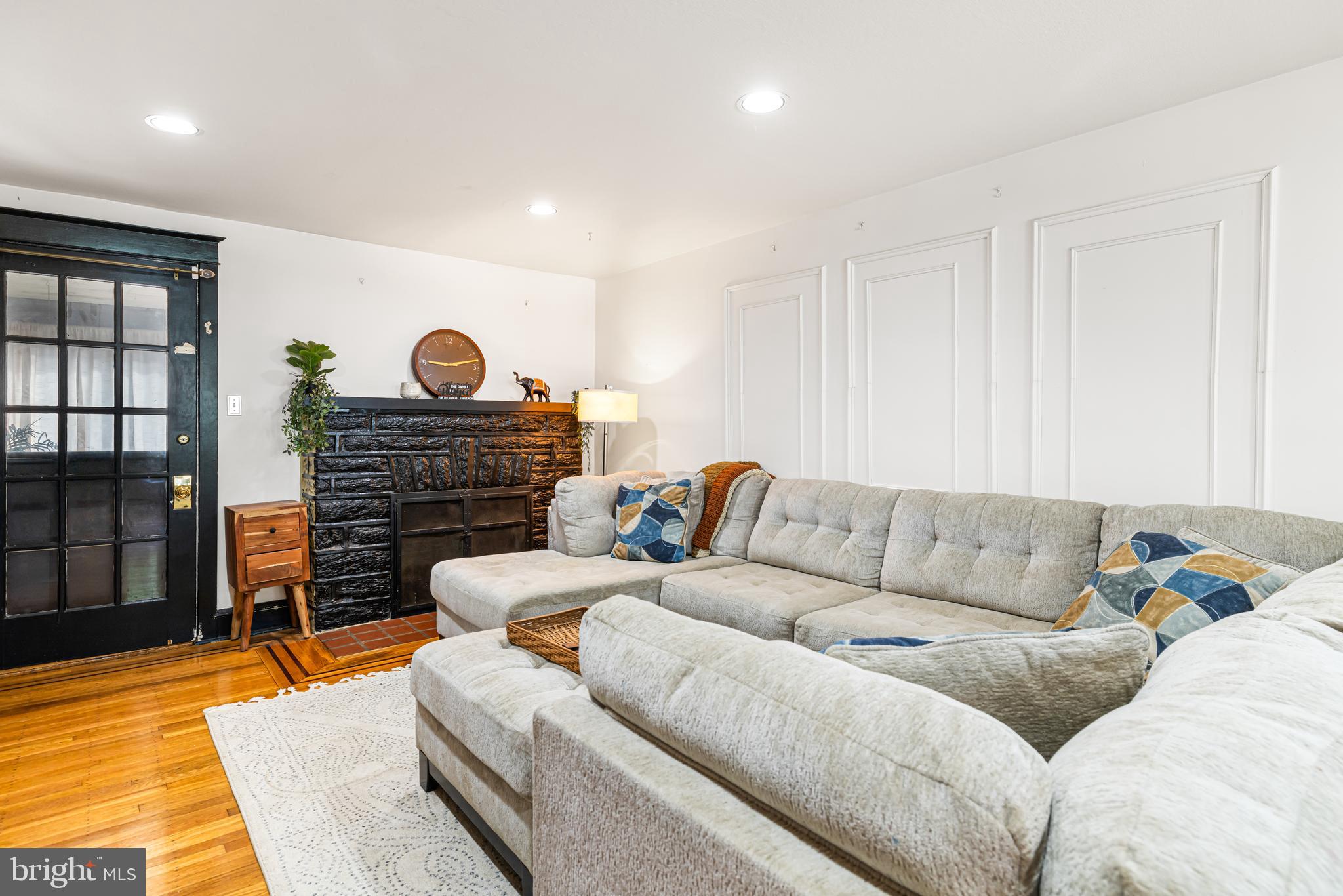 203 Hewett Road Wyncote, PA 19095 - Photo 9 of 47 Spacious living room with fireplace