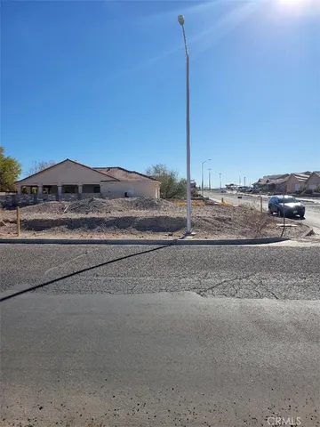 a view of a road with a ocean view