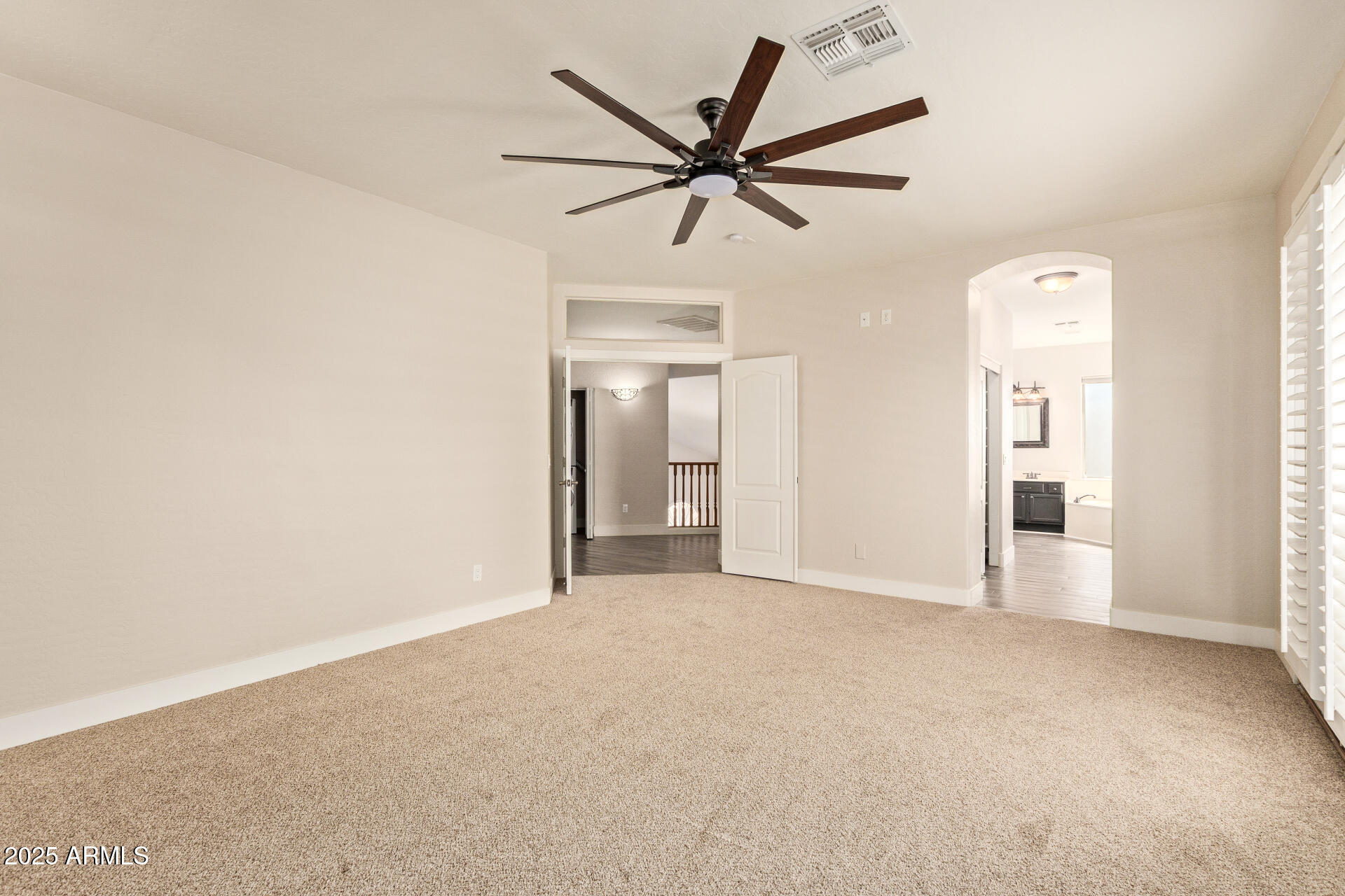 3060 North Ridgecrest, Unit 171 Mesa, AZ 85207 - Photo 16 of 31 a view of a livingroom with a ceiling fan and window