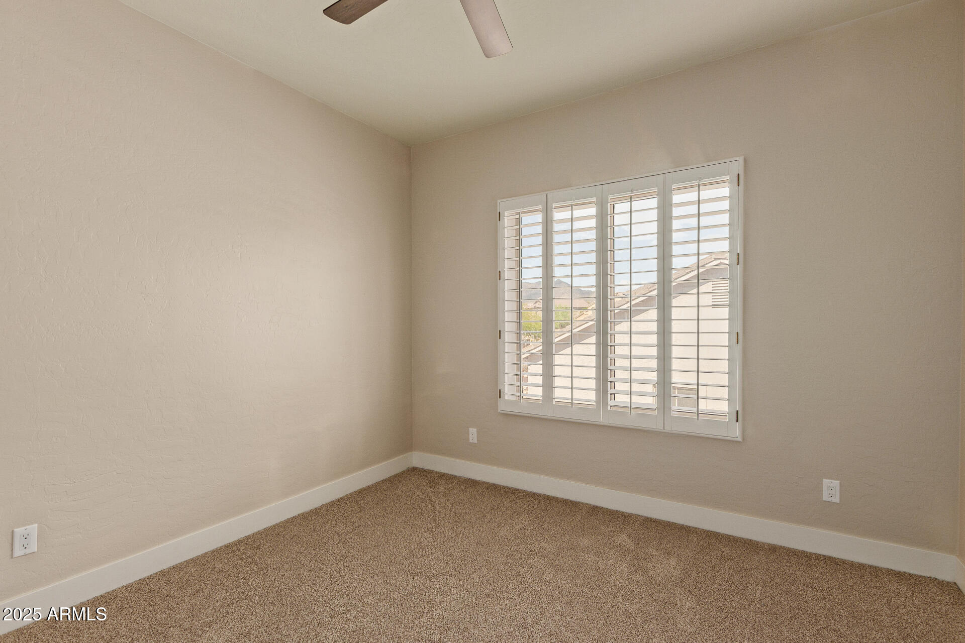 3060 North Ridgecrest, Unit 171 Mesa, AZ 85207 - Photo 23 of 31 an empty room with a window