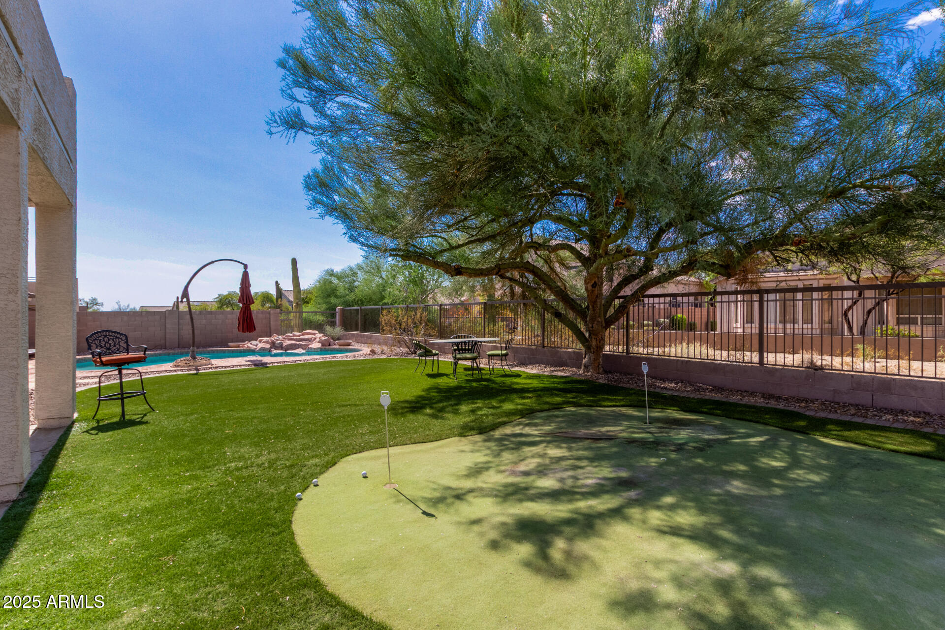 3060 North Ridgecrest, Unit 171 Mesa, AZ 85207 - Photo 30 of 31 a view of a garden with a slide