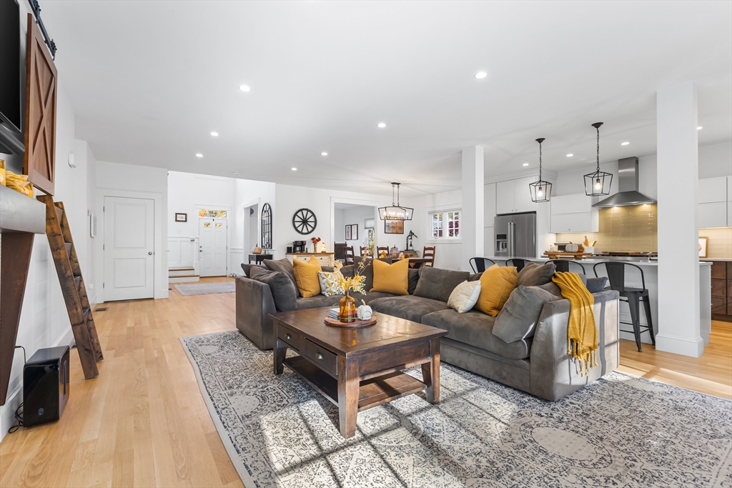 7 Heather Drive Andover, MA 01810 - Photo 13 of 42 a living room with furniture and a flat screen tv