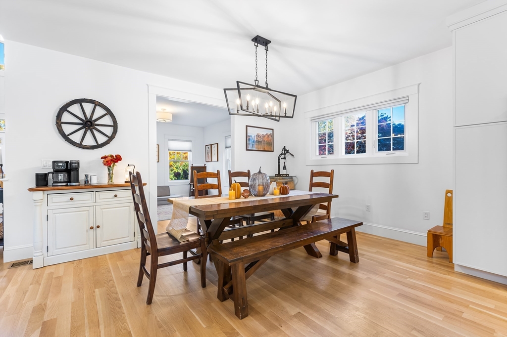 7 Heather Drive Andover, MA 01810 - Photo 17 of 42 a view of a dining room with furniture window and wooden floor