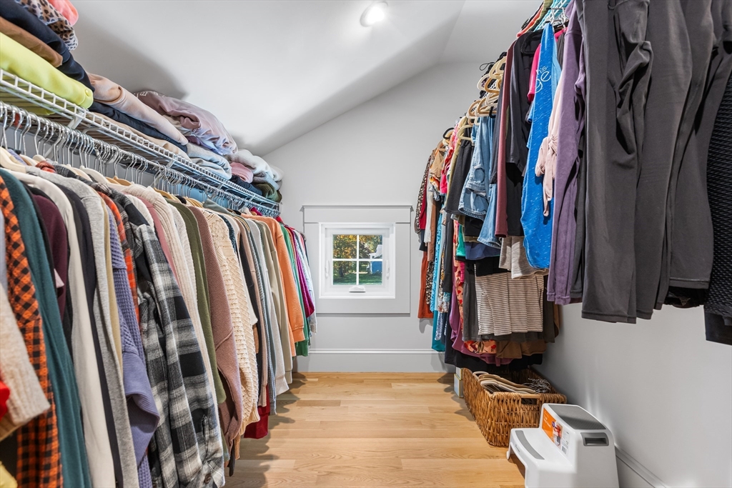 7 Heather Drive Andover, MA 01810 - Photo 24 of 42 a view of walk in closet with clothes and shoes