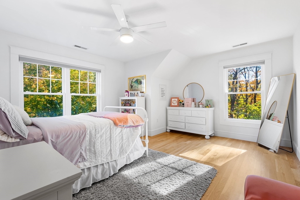 7 Heather Drive Andover, MA 01810 - Photo 25 of 42 a bedroom with a bed a couch and a window