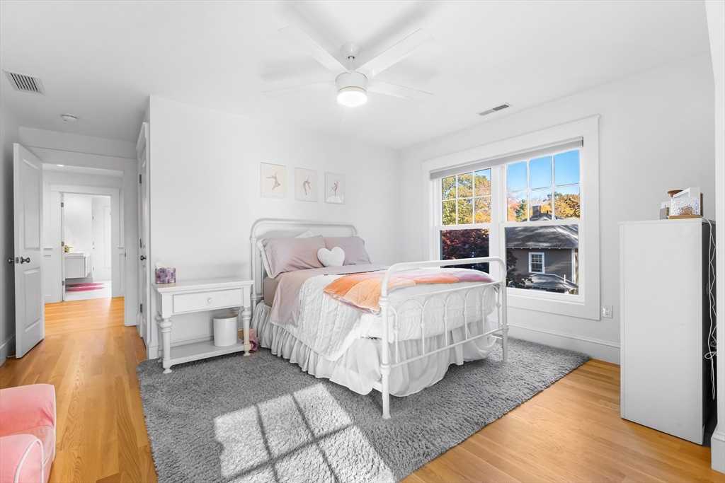 7 Heather Drive Andover, MA 01810 - Photo 26 of 42 a bedroom with a bed and a walk in closet