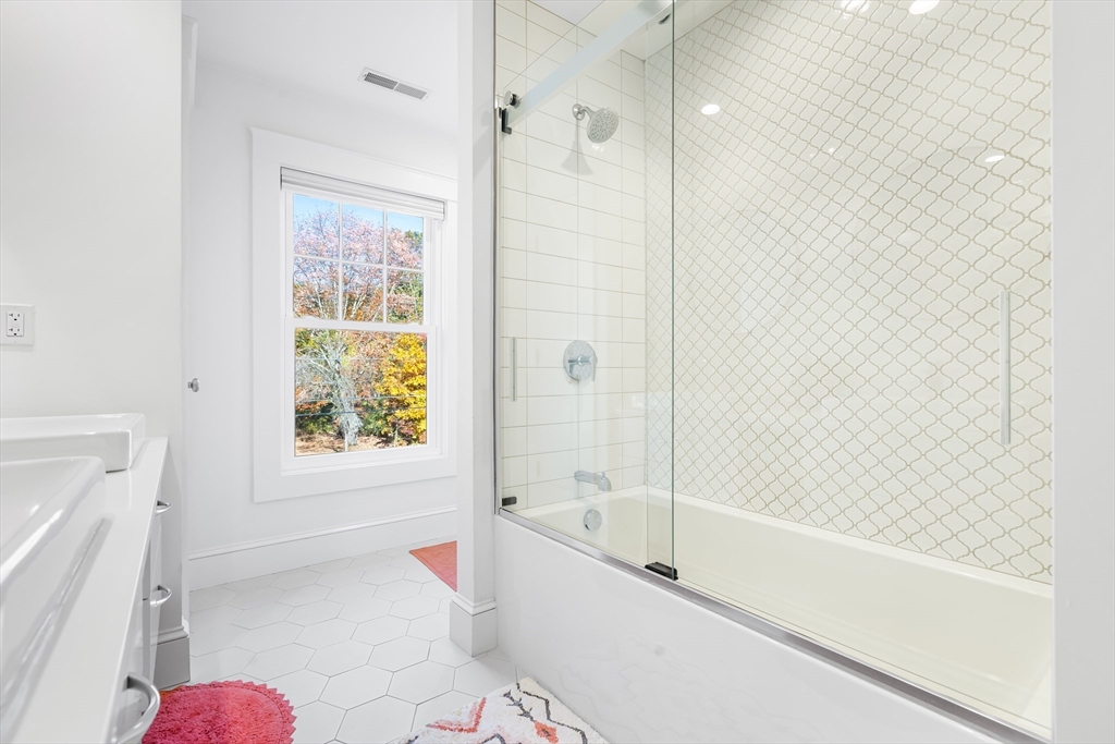 7 Heather Drive Andover, MA 01810 - Photo 29 of 42 a bathroom with a bathtub shower sink and toilet