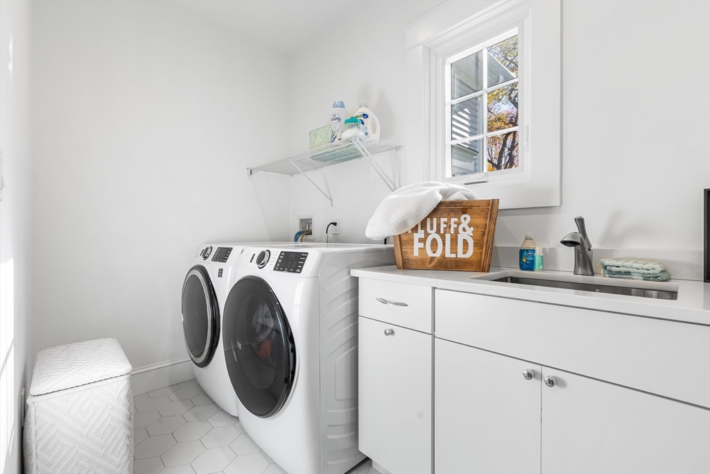 7 Heather Drive Andover, MA 01810 - Photo 34 of 42 a utility room with sink dryer and washer