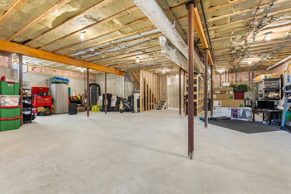 7 Heather Drive Andover, MA 01810 - Photo 36 of 42 a view of a room with gym equipment
