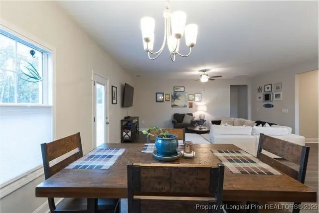 a view of a dining room with furniture
