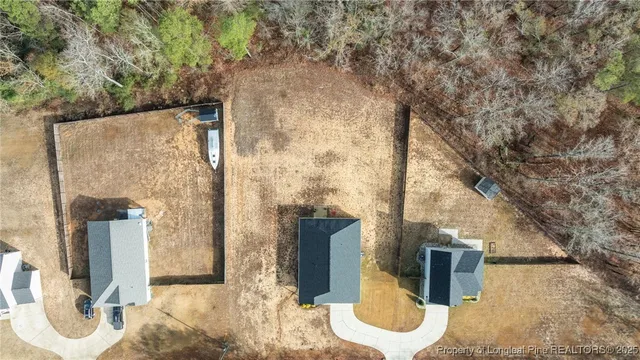 a backyard of a house with seating space