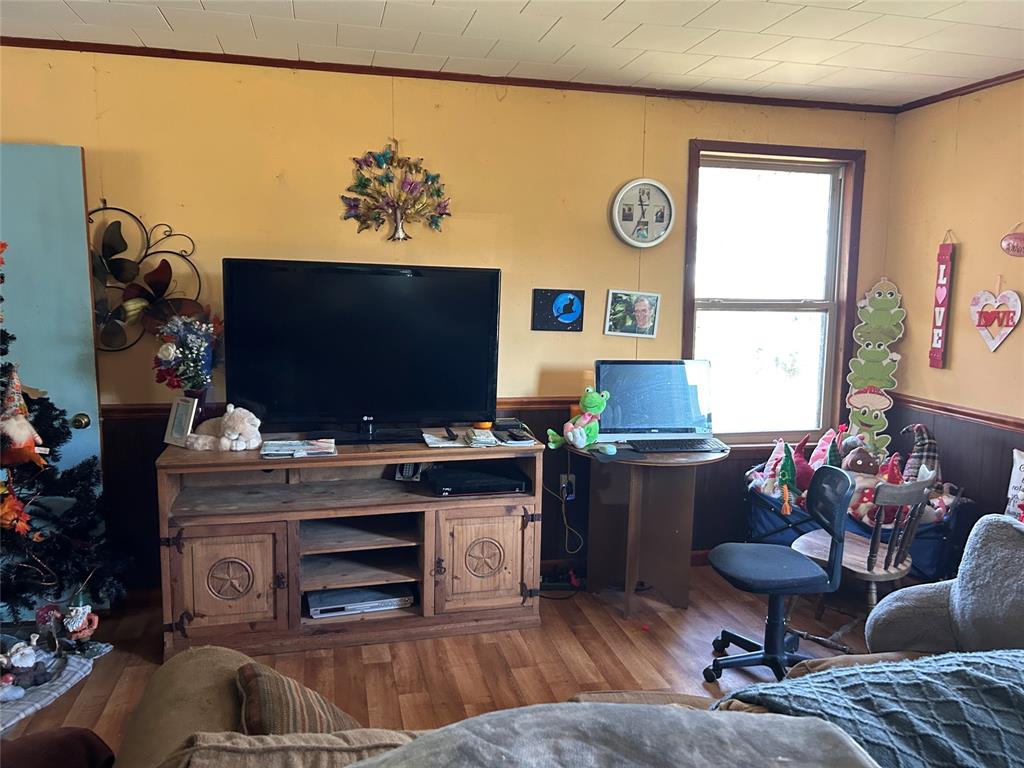 401 Ridge Row Many, LA 71449 - Photo 13 of 20 Office featuring a wainscoted wall, wood finished floors, and wood walls