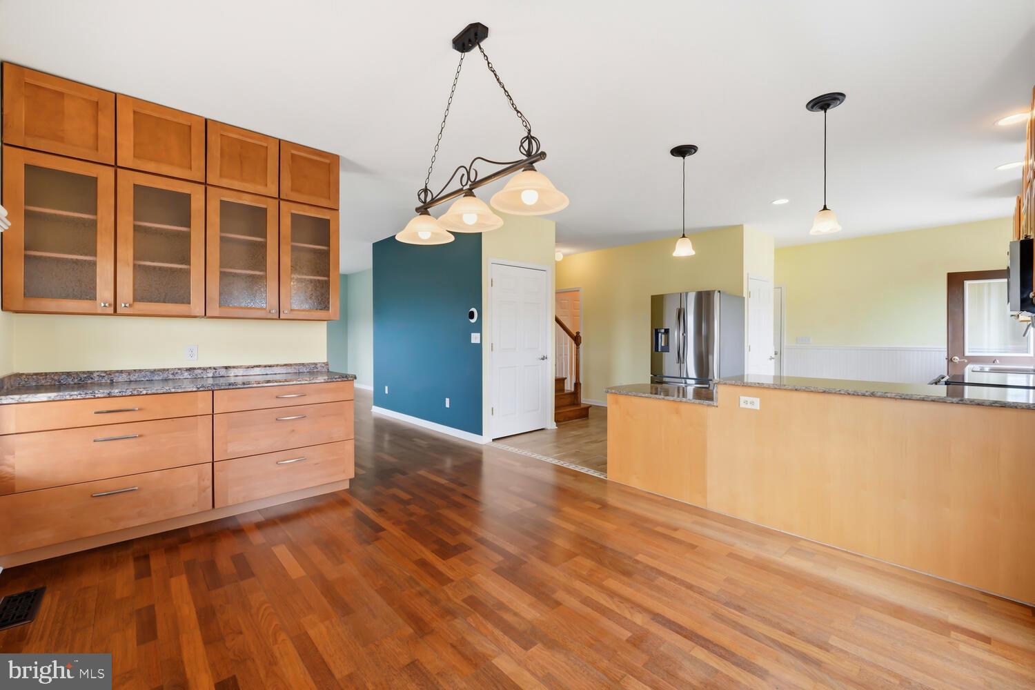 2576 Hoopers Island Road Fishing Creek, MD 21634 - Photo 13 of 43 a view of a kitchen with cabinets and wooden floor