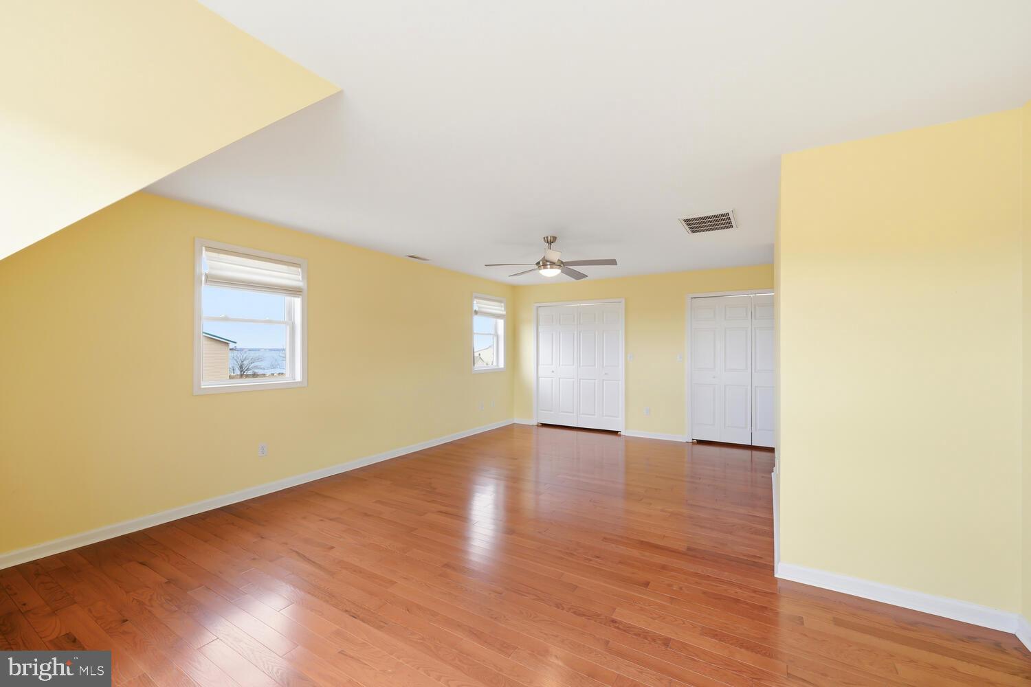 2576 Hoopers Island Road Fishing Creek, MD 21634 - Photo 27 of 43 a view of an empty room with wooden floor