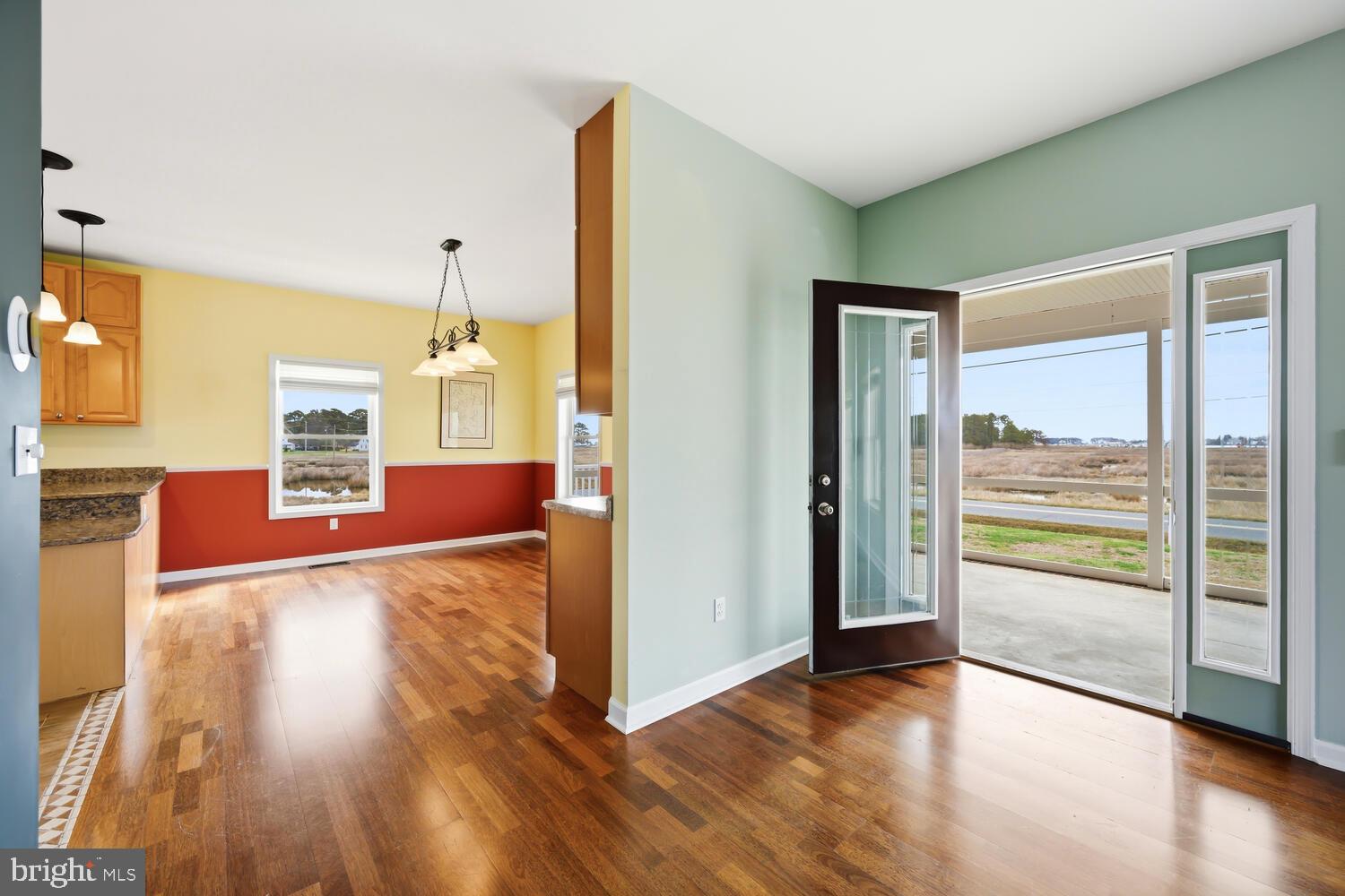 2576 Hoopers Island Road Fishing Creek, MD 21634 - Photo 6 of 43 a view of a living room with hardwood floor