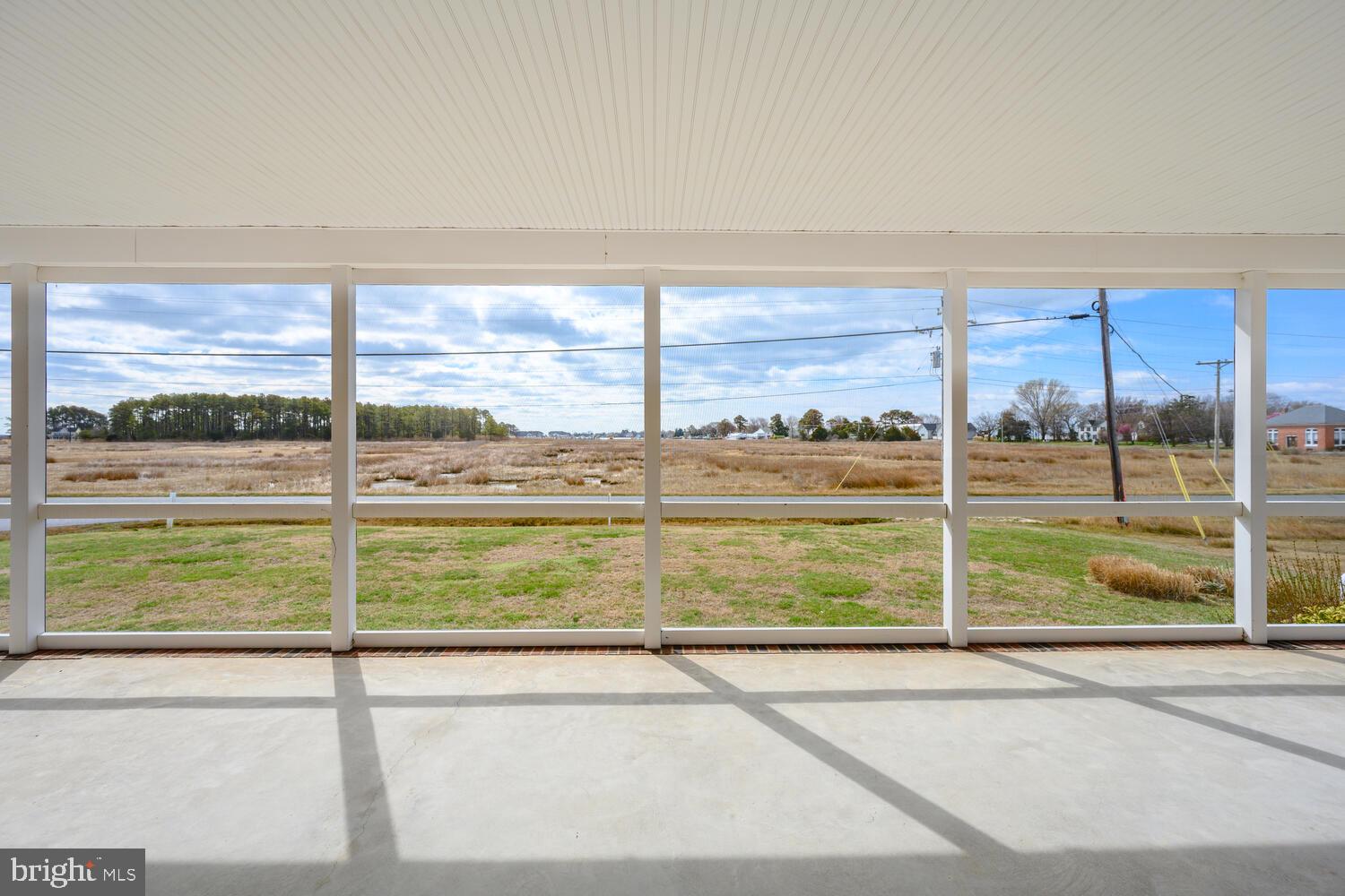 2576 Hoopers Island Road Fishing Creek, MD 21634 - Photo 9 of 43 a view of a large window with an outdoor space