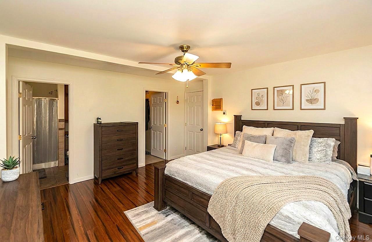 29 Murray Road Middletown, NY 10940 - Photo 8 of 24 a bedroom with a bed and a chandelier