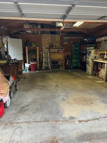 a view of a room with storage and utility room