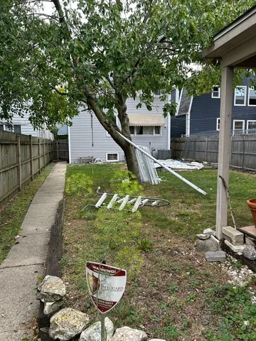 a backyard of a house with seating space