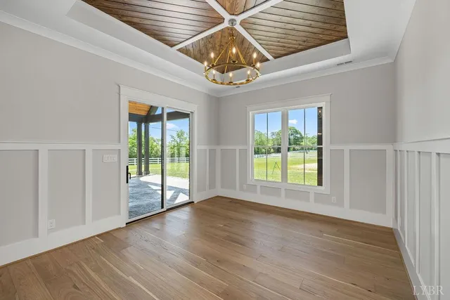a view of a room with a ceiling fan