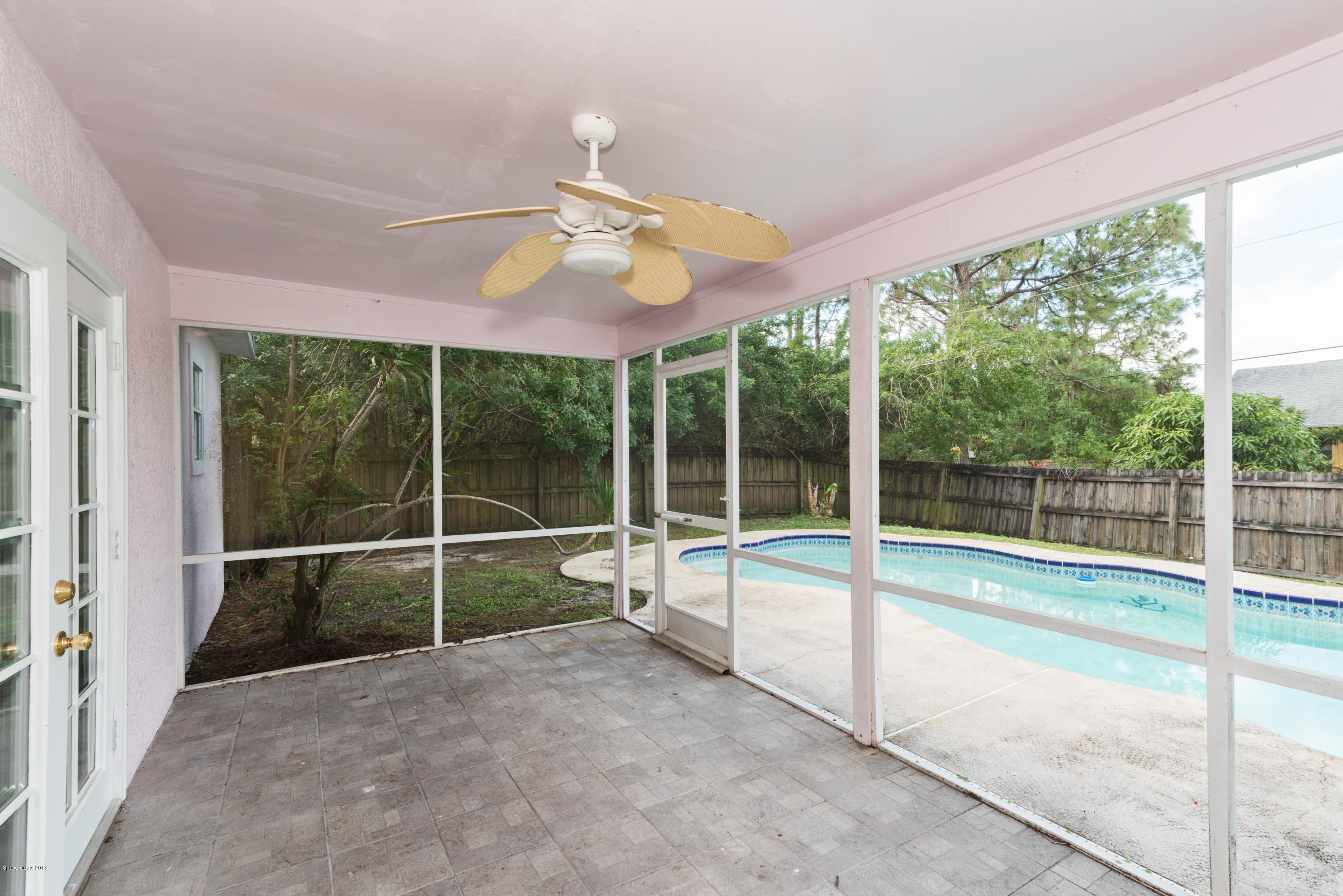 1208 Stadt Road Northwest Palm Bay, FL 32907 - Photo 19 of 24 a view of a room with balcony and a ceiling fan