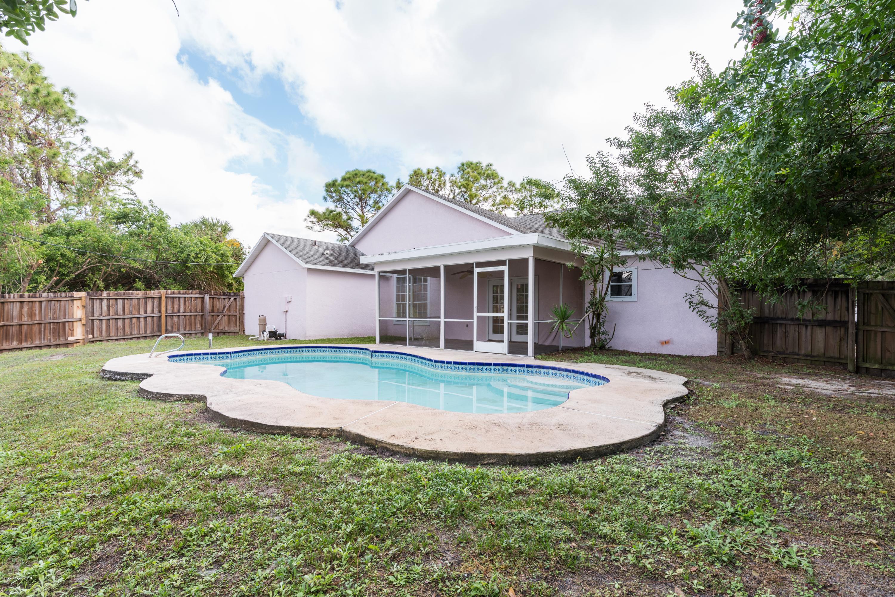 1208 Stadt Road Northwest Palm Bay, FL 32907 - Photo 22 of 24 a view of outdoor space yard and swimming pool