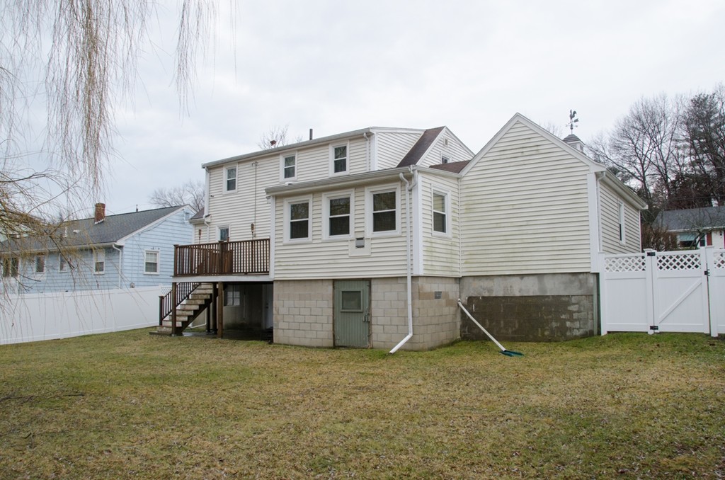 78 Moffatt Road Salem, MA 01970 - Photo 5 of 30 a view of a house with a backyard