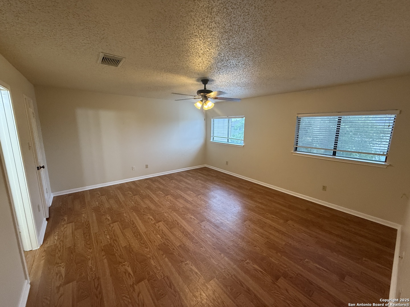 8022 Chestnut Clay Lane Converse, TX 78109 - Photo 15 of 21 a view of an empty room with a window