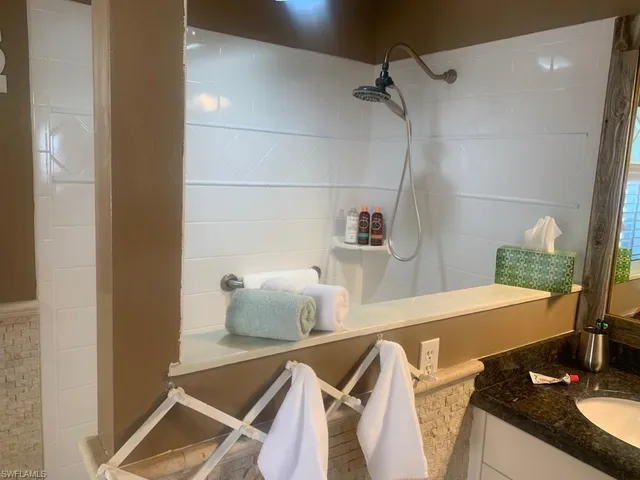 a room with a table and chairs