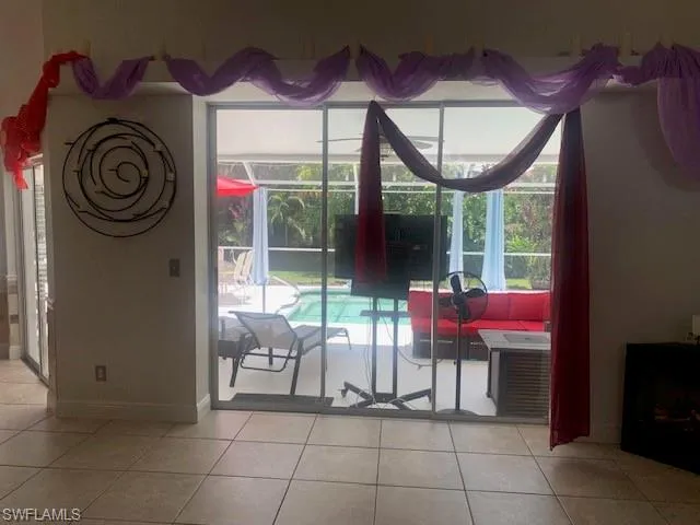 a view of a chairs and table in a patio