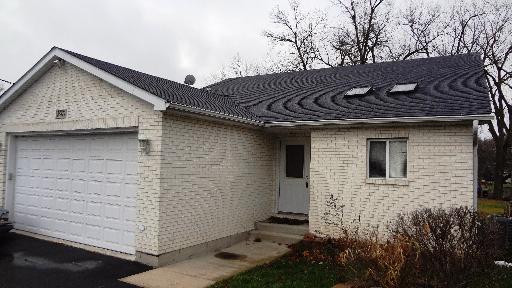 35476 North Wilson Road Ingleside, IL 60041 - Photo 2 of 12 a front view of a house with a yard