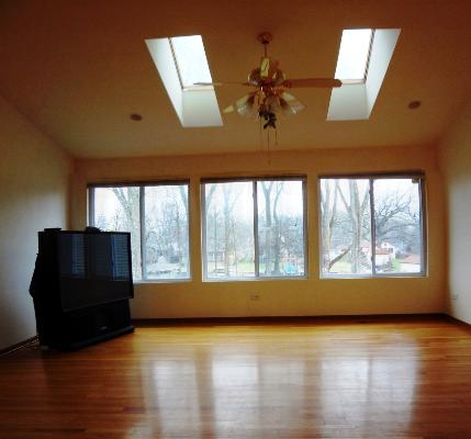 35476 North Wilson Road Ingleside, IL 60041 - Photo 4 of 12 a view of an empty room window and wooden floor