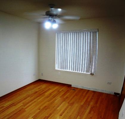 35476 North Wilson Road Ingleside, IL 60041 - Photo 6 of 12 an empty room with wooden floor and windows