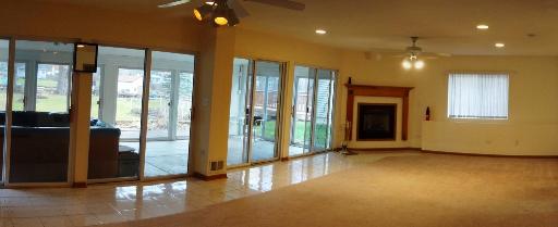 35476 North Wilson Road Ingleside, IL 60041 - Photo 8 of 12 a view of an entryway with a floor to ceiling window and fire pit