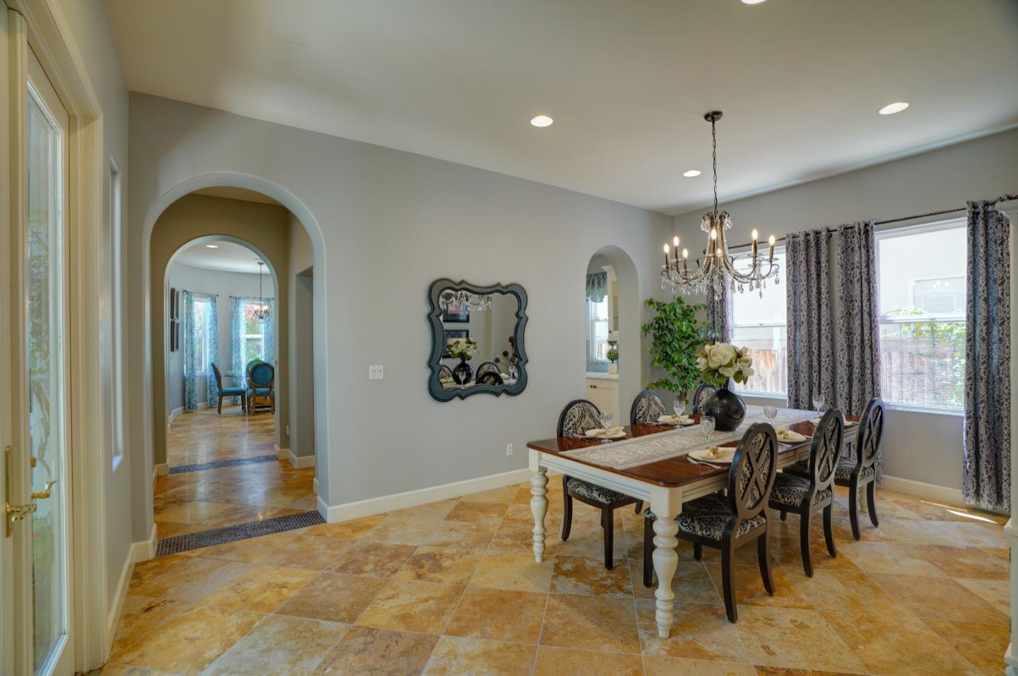 2860 Club Drive Gilroy, CA 95020 - Photo 13 of 87 a view of a dining room with furniture and chandelier