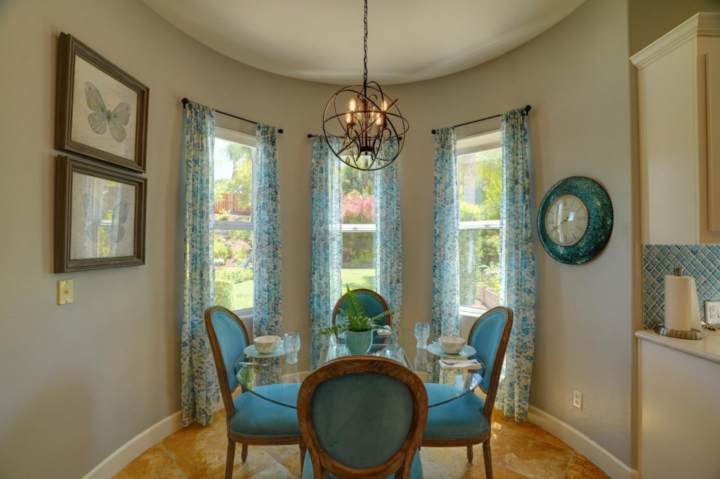 2860 Club Drive Gilroy, CA 95020 - Photo 26 of 87 a dining room with furniture a chandelier and wooden floor